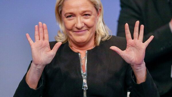 Marine Le Pen, France's National Front political party leader, gestures as she attends the French far-right party's congress in Lyon November 29, 2014 - Sputnik International