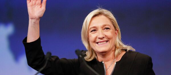 Marine Le Pen, France's National Front political party leader, waves as she attends the far-right party's congress in Lyon November 29, 2014 Marine Le Pen, France's National Front political party leader, waves as she attends the far-right party's congress in Lyon November 29, 2014 - Sputnik International