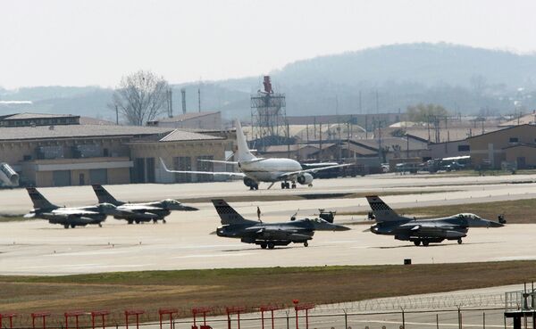 U.S. Air Force F-16 fighter jets wait to take off from a runway during a military exercise at the Osan U.S. Air Base in Osan, South Korea U.S. Air Force F-16 fighter jets wait to take off from a runway during a military exercise at the Osan U.S. Air Base in Osan, South Korea - Sputnik International