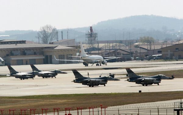 U.S. Air Force F-16 fighter jets wait to take off from a runway during a military exercise at the Osan U.S. Air Base in Osan, South Korea - Sputnik International