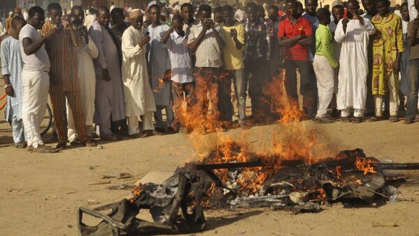 People gather at the site of a bomb explosion in Kano, Nigeria - Sputnik International