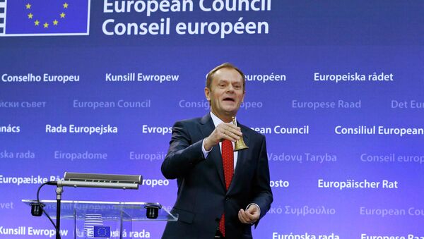 Former Polish Prime Minister Donald Tusk rings a bell he received from outgoing European Council President, Herman Van Rompuy, at a ceremony during which Tusk took over from Van Rompuy and officially replaced him as head of the European Council, in Brussels. - Sputnik International