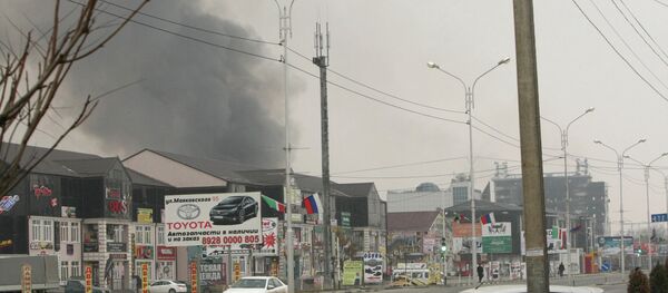 Counter-terrorism operation at Press House in Grozny - Sputnik International