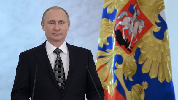 Russian President Vladimir Putin delivers the annual Presidential Address to the Federal Assembly at the Kremlin's St. George's Hall. - Sputnik International