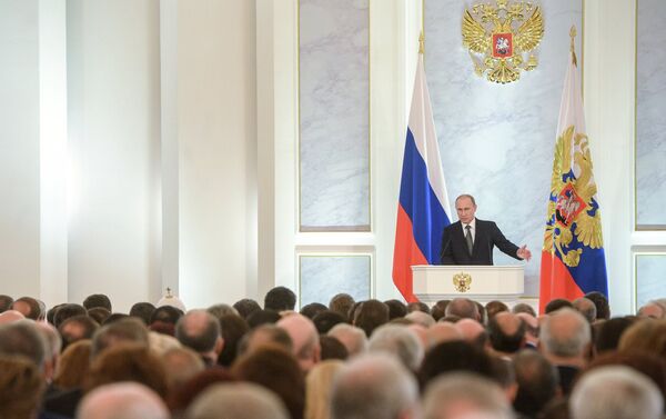 Russian President Vladimir Putin delivers the annual Presidential Address to the Federal Assembly at the Kremlin's St. George's Hall. - Sputnik International