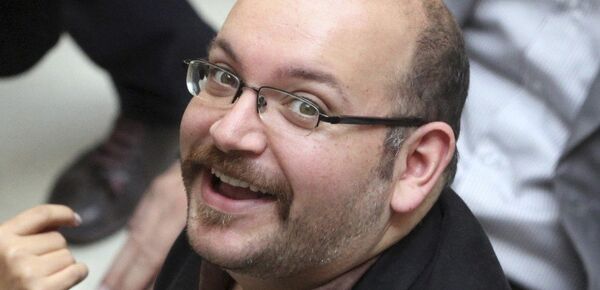 Jason Rezaian, an Iranian-American correspondent for the Washington Post smiles as he attends a presidential campaign of President Hassan Rouhani in Tehran, Iran. (File) Jason Rezaian, an Iranian-American correspondent for the Washington Post smiles as he attends a presidential campaign of President Hassan Rouhani in Tehran, Iran. (File) - Sputnik International