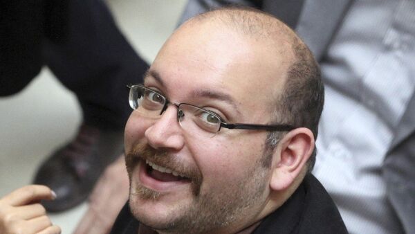 Jason Rezaian, an Iranian-American correspondent for the Washington Post smiles as he attends a presidential campaign of President Hassan Rouhani in Tehran, Iran. (File) - Sputnik International
