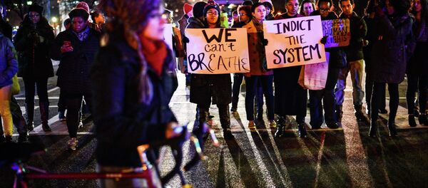 Several hundred protesters have marched peacefully through the streets of Washington, DC calling for an end to police brutality and blocking street intersections Several hundred protesters have marched peacefully through the streets of Washington, DC calling for an end to police brutality and blocking street intersections - Sputnik International