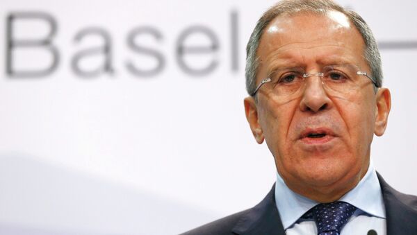 Russia's Foreign Minister Sergei Lavrov speaks to media in a news conference during a meeting of foreign ministers from the Organization for Security and Cooperation in Europe (OSCE) in Basel December 5, 2014 - Sputnik International