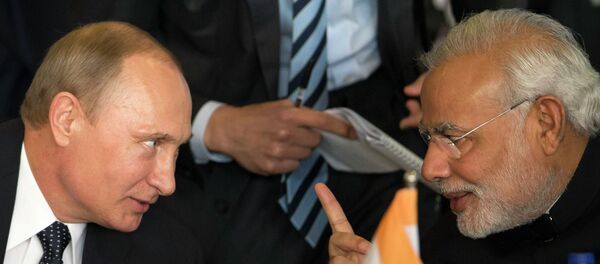 Russia's President Vladimir Putin, left, and India's Prime Minister Narendra Modi chat during the BRICS Summit at the Itamaraty Palace, in Brasilia, Brazil, Wednesday, July 16, 2014 - Sputnik International