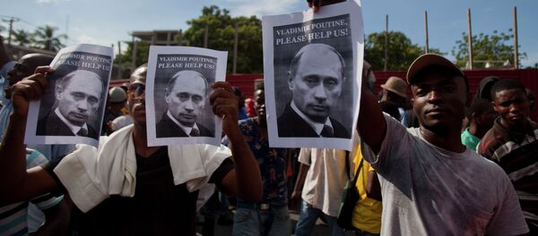 Anti-government demonstrators hold up help signs directed at Russia's President Vladimir Putin Anti-government demonstrators hold up help signs directed at Russia's President Vladimir Putin - Sputnik International