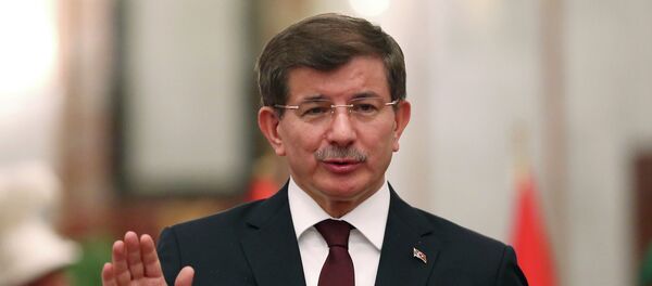 Turkey's Prime Minister Ahmet Davutoglu speaks at a news conference with Iraqi Prime Minister Haider al-Abadi (not pictured) in Baghdad, November 20, 2014 Turkey's Prime Minister Ahmet Davutoglu speaks at a news conference with Iraqi Prime Minister Haider al-Abadi (not pictured) in Baghdad, November 20, 2014 - Sputnik International