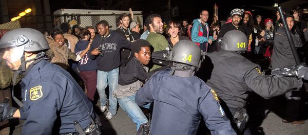 Police officers scuffle with protesters during a protest against police violence in the U.S., in Berkeley, California December 6, 2014 Police officers scuffle with protesters during a protest against police violence in the U.S., in Berkeley, California December 6, 2014 - Sputnik International