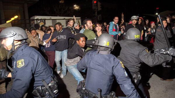 Police officers scuffle with protesters during a protest against police violence in the U.S., in Berkeley, California December 6, 2014 - Sputnik International