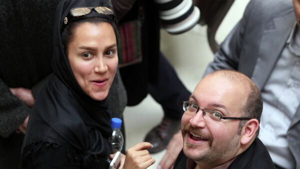 In this photo taken on April 11, 2013, Jason Rezaian, right, an Iranian-American correspondent for the Washington Post, and his wife Yeganeh Salehi - Sputnik International