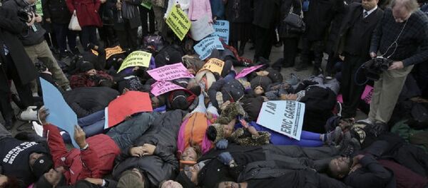 Religious Groups reportedly held peaceful protests in Chicago over two recent US grand jury decisions not to indict white police officers who were responsible for the deaths of African-American men. Religious Groups reportedly held peaceful protests in Chicago over two recent US grand jury decisions not to indict white police officers who were responsible for the deaths of African-American men. - Sputnik International