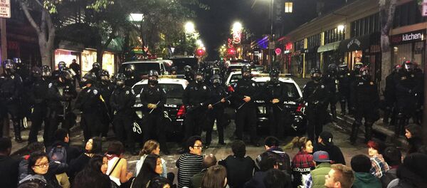 This photo provided by Gabriel Reyes shows the protest in Berkeley, Calif., Sunday, Dec. 7. 2014 This photo provided by Gabriel Reyes shows the protest in Berkeley, Calif., Sunday, Dec. 7. 2014 - Sputnik International