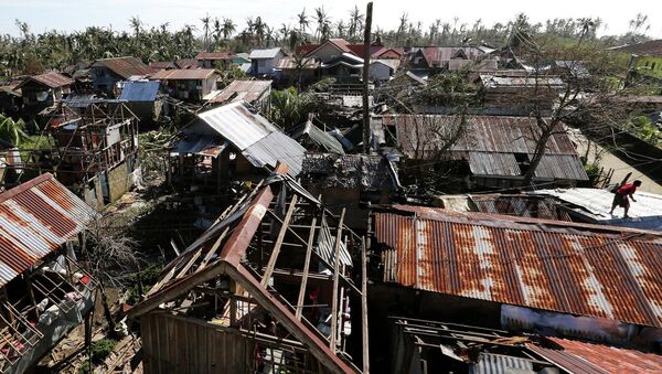 A general view of damaged houses swept by Typhoon Hagupit in Eastern Samar, in central Philippines December 8, 2014 - Sputnik International