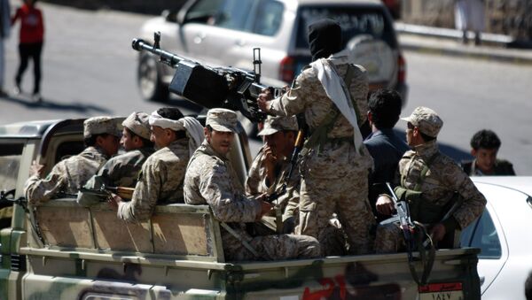 The media sources report that five masked men from the paramilitary National Security Forces stopped Khaled al-Junaidi and shot him. Above: Yemeni soldiers patrol a street near the Defense Ministry compound in Sanaa, Yemen. - Sputnik International