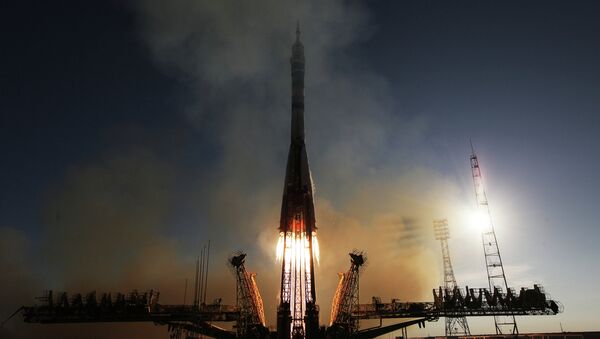 Launch of Soyuz-FG rocket with manned spacecraft Soyuz TMA-11M - Sputnik International