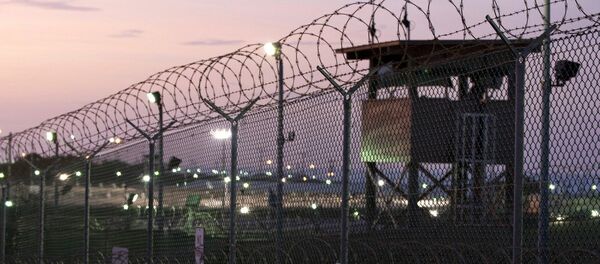 Guard tower at dawn at Camp Delta the military prison at Naval Base Guantanamo Bay Cuba Guard tower at dawn at Camp Delta the military prison at Naval Base Guantanamo Bay Cuba - Sputnik International