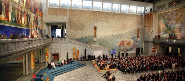 Nobel Peace Prize laureate Malala Yousafzai (L) delivers her speech during the Nobel Peace Prize awards ceremony at the City Hall in Oslo December 10, 2014. Pakistani teenager Yousafzai, shot by the Taliban for refusing to quit school, and Indian activist Kailash Satyarthi received their Nobel Peace Prizes on Wednesday after two days of celebration honouring their work for children's rights. - Sputnik International