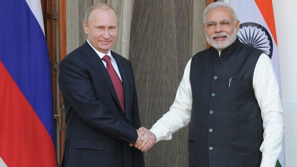 Russian President Vladimir Putin, left, and Indian Prime Minister Narendra Modi meet in New Delhi - Sputnik International