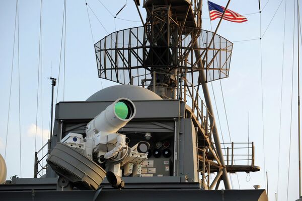 The laser weapon system (LaWS) is tested aboard the USS Ponce amphibious transport dock during an operational demonstration while deployed in the Gulf The laser weapon system (LaWS) is tested aboard the USS Ponce amphibious transport dock during an operational demonstration while deployed in the Gulf - Sputnik International