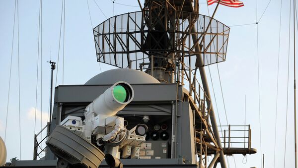 The laser weapon system (LaWS) is tested aboard the USS Ponce amphibious transport dock during an operational demonstration while deployed in the Gulf - Sputnik International