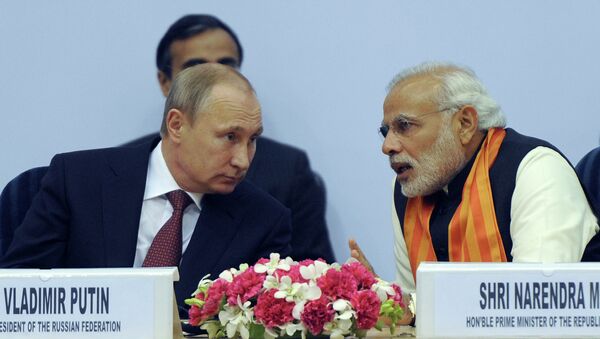 Russian President Vladimir Putin (left) and Indian Prime Minister Narendra Modi attending the World Diamond Conference in the Vigyan Bhawan Palace, New Delhi - Sputnik International