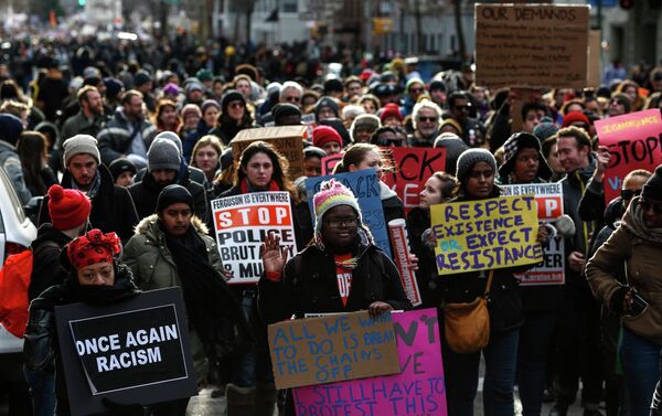 People take part in a march against police violence, in New York December 13, 2014 - Sputnik International