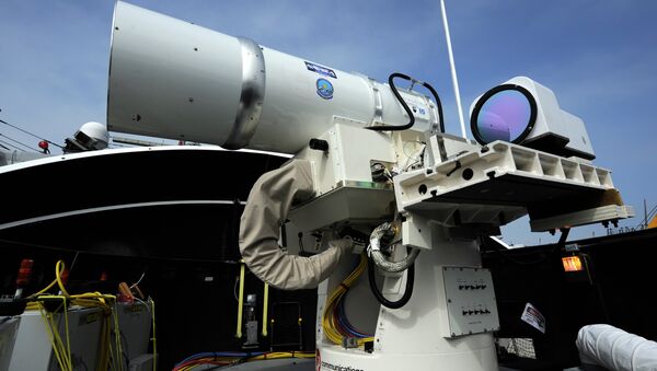 The Laser Weapon System (LaWS) temporarily installed aboard the guided-missile destroyer USS Dewey (DDG 105) in San Diego - Sputnik International