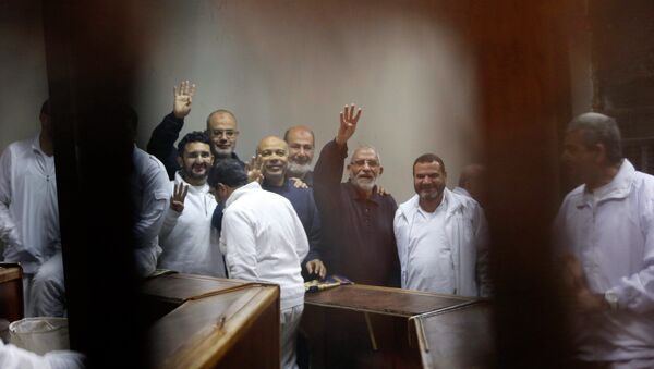 Muslim Brotherhood's Supreme Guide Mohamed Badie (3rd R) with other brotherhood members at a court in the outskirts of Cairo - Sputnik International