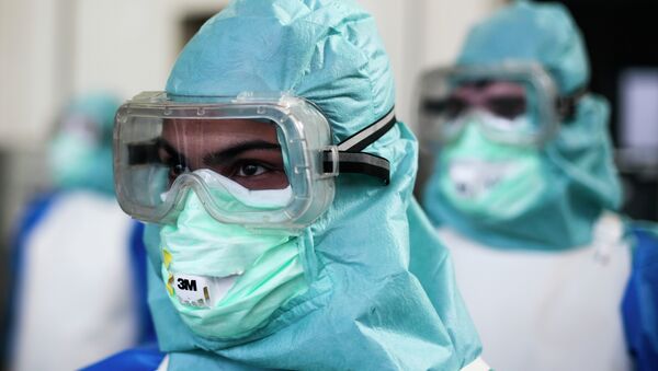 Ebola Health Care Workers - Sputnik International