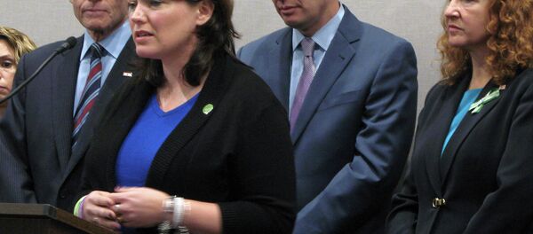 Nicole Hockley, whose 6-year-old Dylan died in the Sandy Hook Elementary School shootings in 2012, speaks at a news conference Monday, Dec. 15, 2014, in Hartford, Conn., marking the second anniversary of the shooting and calling for more legislation to curb gun violence. Nicole Hockley, whose 6-year-old Dylan died in the Sandy Hook Elementary School shootings in 2012, speaks at a news conference Monday, Dec. 15, 2014, in Hartford, Conn., marking the second anniversary of the shooting and calling for more legislation to curb gun violence. - Sputnik International
