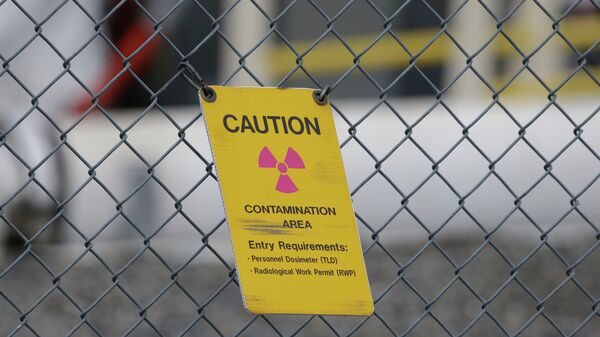 A sign warning of radioactive contamination - Sputnik International