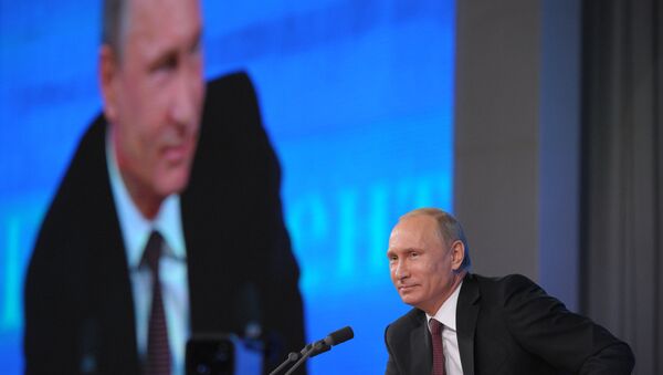 Russian President Vladimir Putin at major press coference on December 19, 2013. - Sputnik International