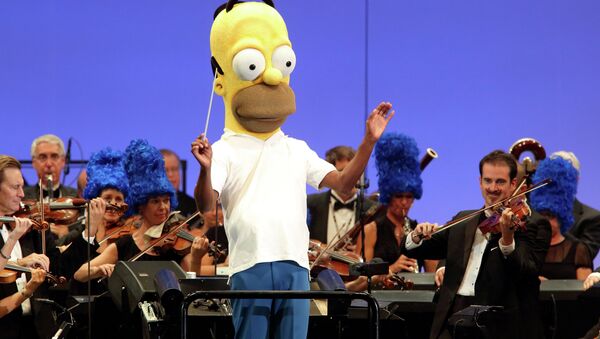 The orchestra, led by conductor Thomas Wilkins in a Homer Simpson costume, performs at the world premiere of The Simpsons Take the Bowl at the legendary concert venue in Los Angeles - Sputnik International