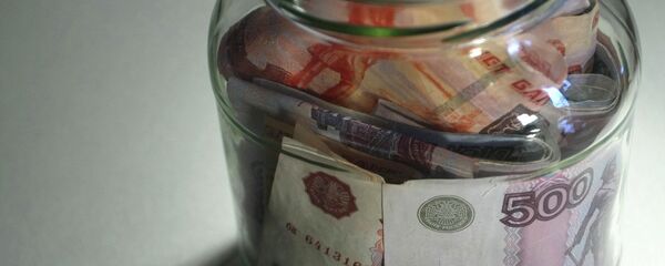 Ruble and euro banknotes of different denominations in a jar. - Sputnik International