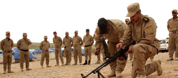 Sunni volunteers from Mosul take part in military training as they prepare to fight against militants of the Islamic State on the outskirts of Dohuk province December 8, 2014. Picture taken December 8, 2014. Sunni volunteers from Mosul take part in military training as they prepare to fight against militants of the Islamic State on the outskirts of Dohuk province December 8, 2014. Picture taken December 8, 2014. - Sputnik International