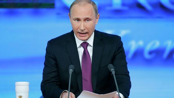 Russian President Vladimir Putin said current downturn in Russian economy was provoked by external factors. - Sputnik International