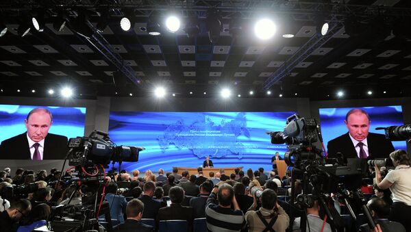 President of Russia Vladimir Putin during his tenth annual major news conference at the World Trade Centre - Sputnik International