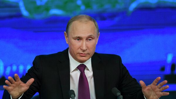 Russian President Vladimir Putin speaks during his annual news conference in Moscow - Sputnik International