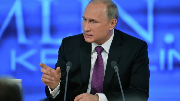 Russian President Vladimir Putin speaks during his annual news conference in Moscow - Sputnik International