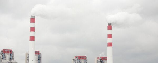 Smoke is discharged from chimneys at the Waigaoqiao coal-fired power plant in Pudong, Shanghai, China Smoke is discharged from chimneys at the Waigaoqiao coal-fired power plant in Pudong, Shanghai, China - Sputnik International