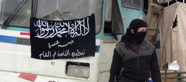 A member of Islamist Syrian rebel group Jabhat al-Nusra mans a checkpoint on the border crossing between Syria and Jordan, which they claim to have taken control of, in Daraa December 26, 2013. - Sputnik International