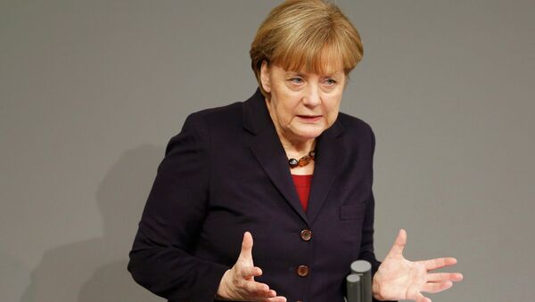 German Chancellor Angela Merkel stated that since Russian President Vladimir Putin announced his commitment to the territorial integrity of Ukraine, his words should be trusted. - Sputnik International