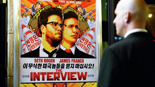 A security guard stands at the entrance of United Artists theater during the premiere of the film The Interview in Los Angeles, California in this December 11, 2014 file photo. - Sputnik International