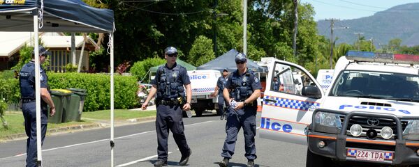 Police patrol near a house where eight children have been found dead in a Cairns suburb in far north Queensland, Australia. - Sputnik International