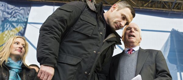 US Senator John McCain and leader of the UDAR opposition political party, Vitaly Klitschko, at the Dignity Day rally held by supporters of pro-EU integration in Kiev. US Senator John McCain and leader of the UDAR opposition political party, Vitaly Klitschko, at the Dignity Day rally held by supporters of pro-EU integration in Kiev. - Sputnik International